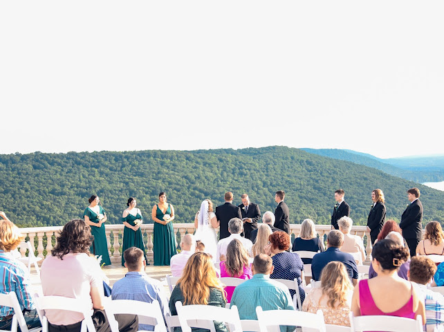 Outdoor wedding ceremony with mountain views